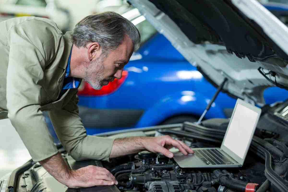 A car dashboard with the check engine light illuminated during an inspection.