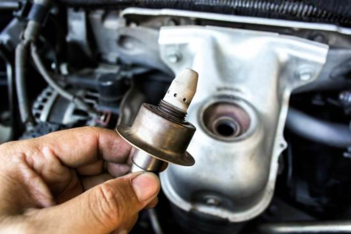 Car dashboard showing “Vehicle Software or Sensor Calibration” warning with a yellow alert triangle.