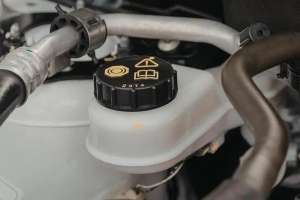 Low brake fluid Low brake fluid level visible in the car’s brake fluid reservoir.