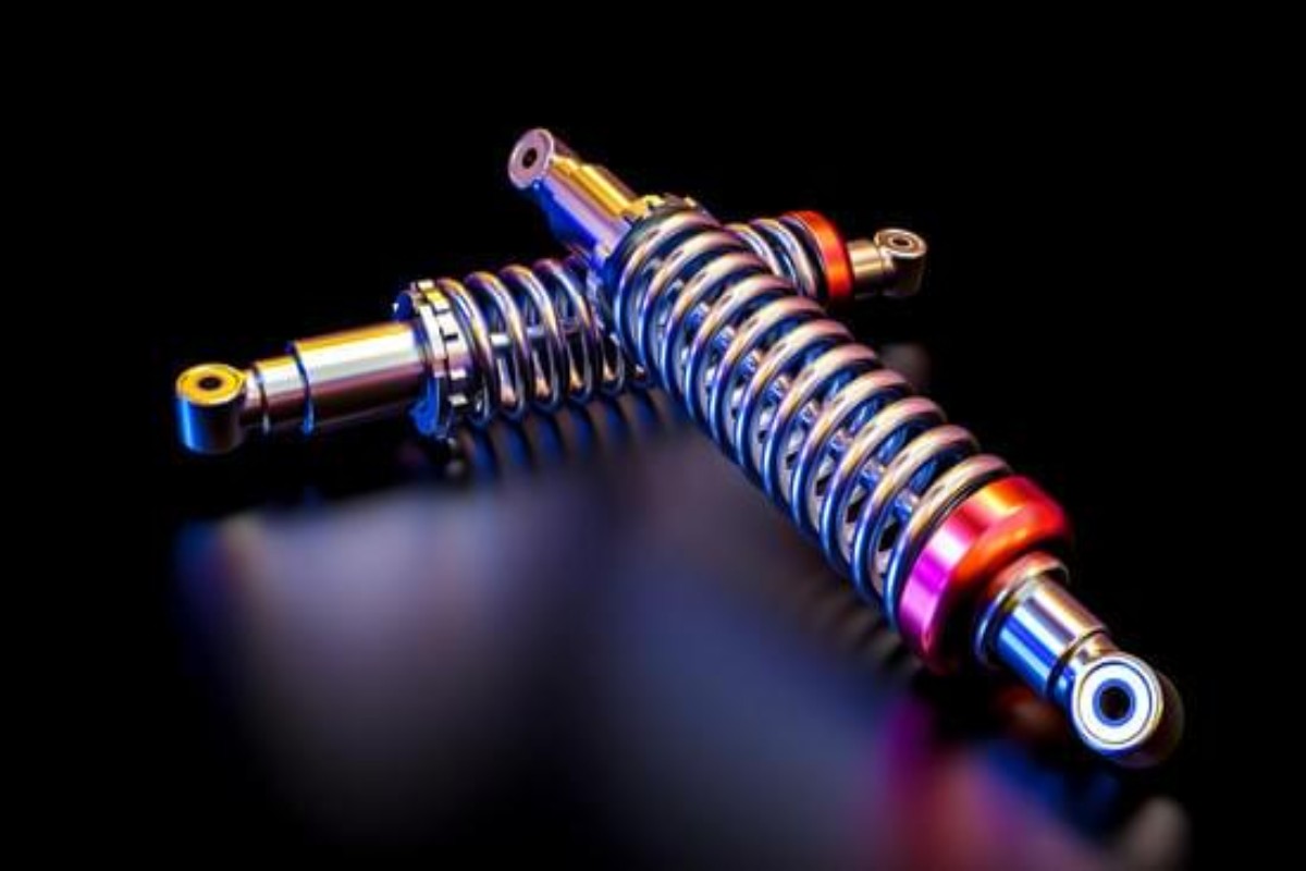 Worn shock absorber with oil leakage causing reduced suspension performance