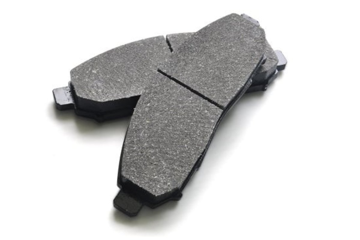 Worn and uneven brake pads causing thumping noise when braking
